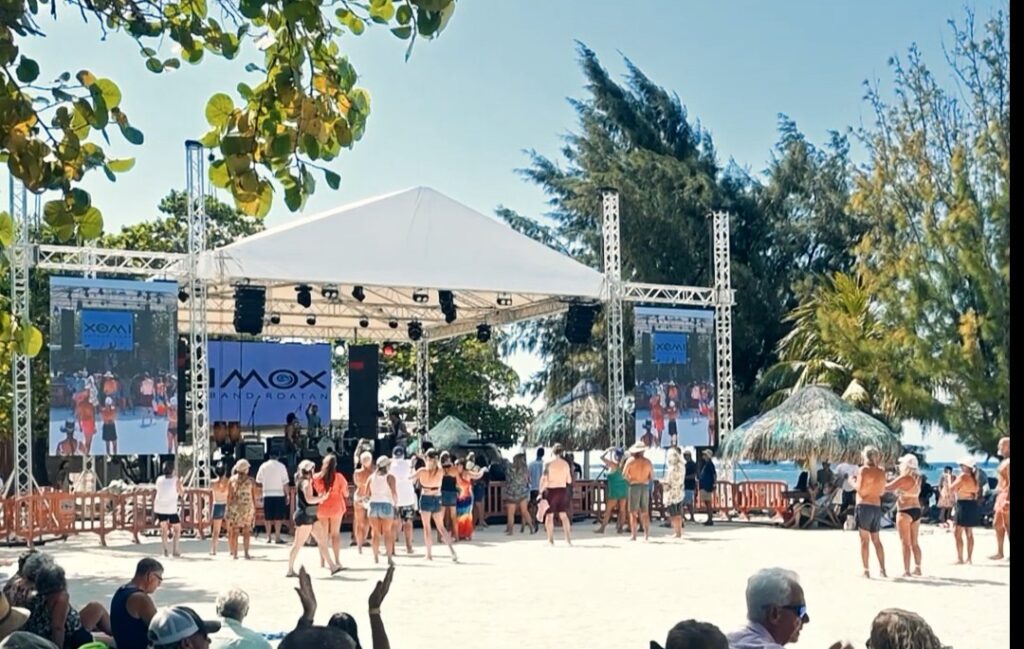 Beach festival stage with truss and LED screens